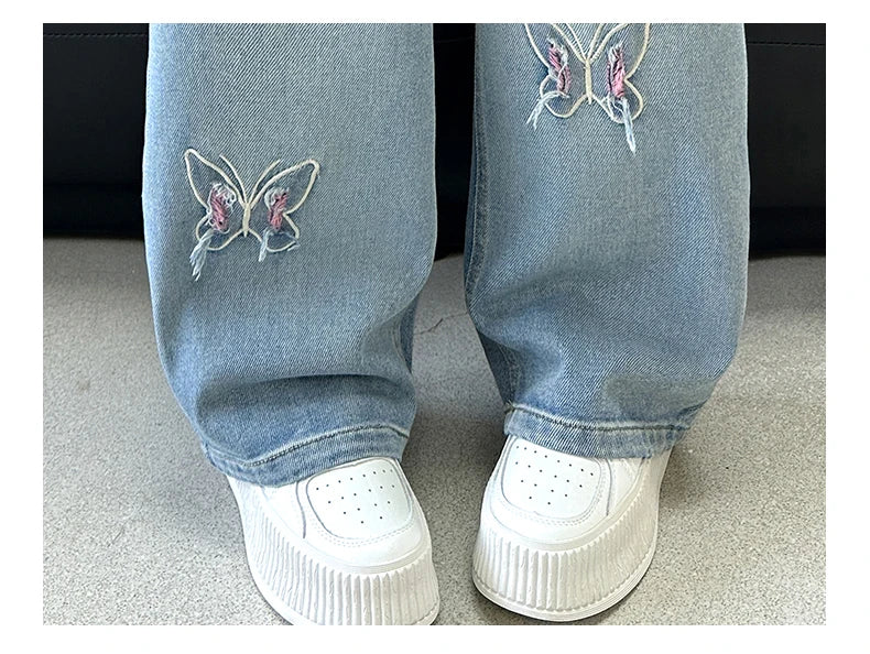 Girls versatile butterfly ripped  jeans wide-leg pants 2025 new product fashionable versatile medium and large children slimming